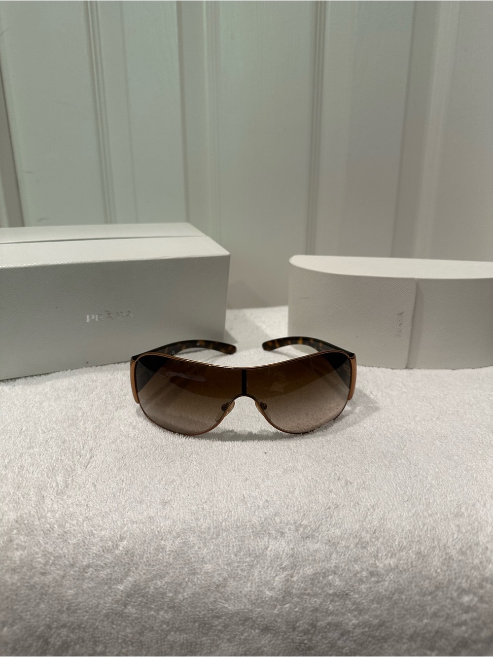 Prada Tortoiseshell Temple Sunglasses with Gold Accents